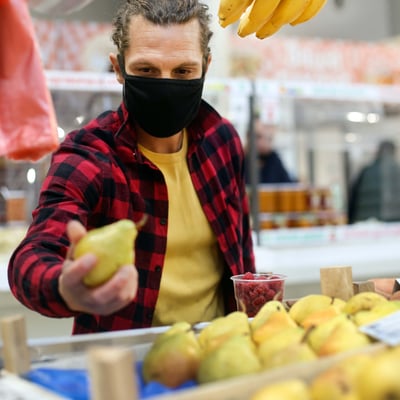 Man wearing mask for COVID-19 IQ Credit Union